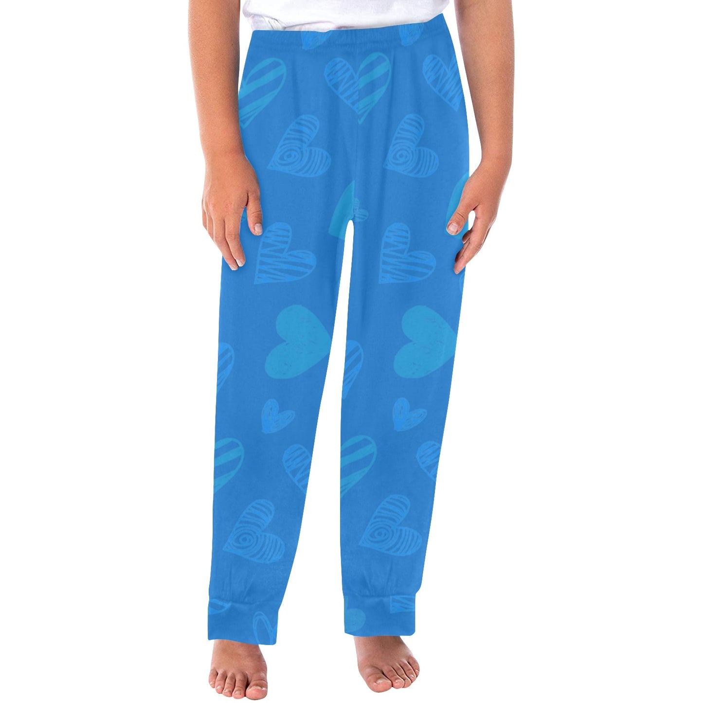 Girls all over print pajama bottoms "Hearts in Harmony" featuring a playful heart design on blue fabric.